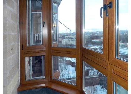 Французское остекление балкона профилем Veka с ламинированием под дерево в Зеленограде